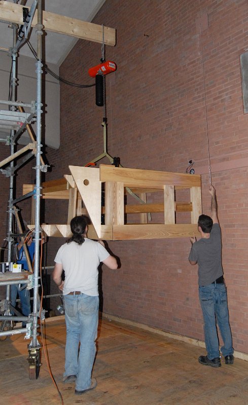 DSC_4650.JPG - Raising the west antiphonal framing into position.