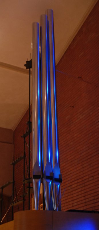 DSC_4861.JPG - Just a hint of what's to come once the main facade pipes are in place...reflections of the rear blue windows on the fcade pipes of the antiphonal.