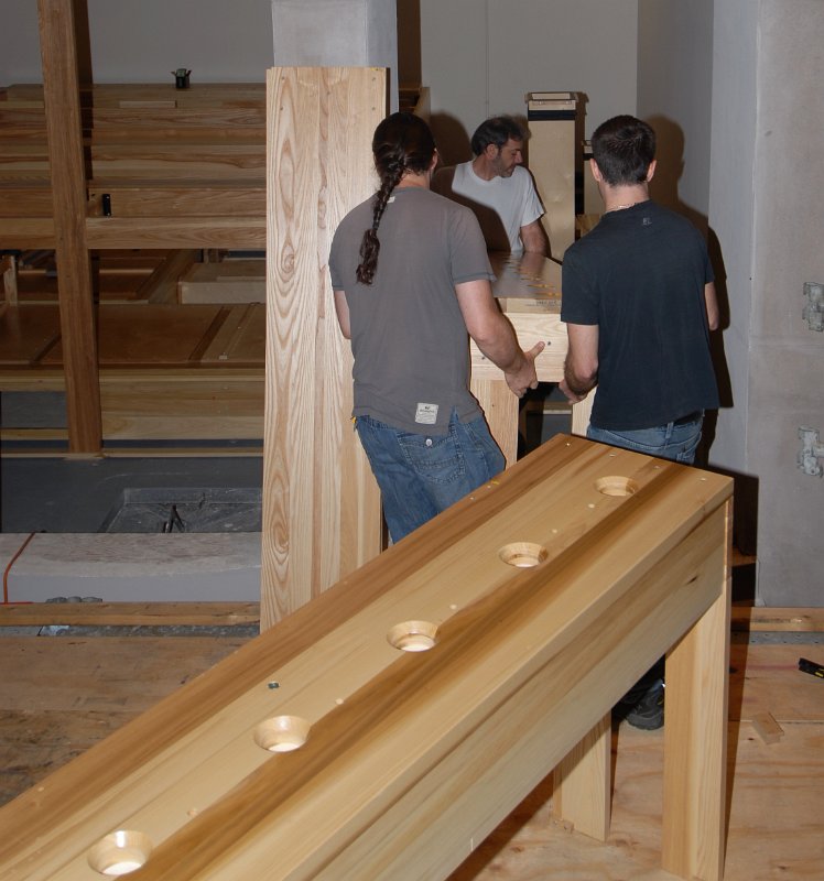 DSC_5136.JPG - Moving wind chests into the pulpit-side chamber.