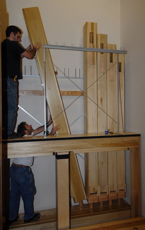 DSC_5252.JPG - Installing the 16' pipes in the lectern-side chamber.