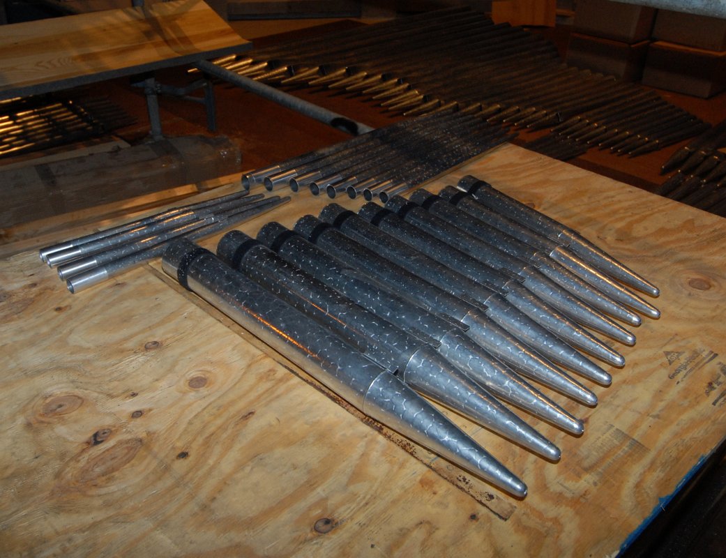 DSC_5743.JPG - Pipes staged for installation into the chambers.