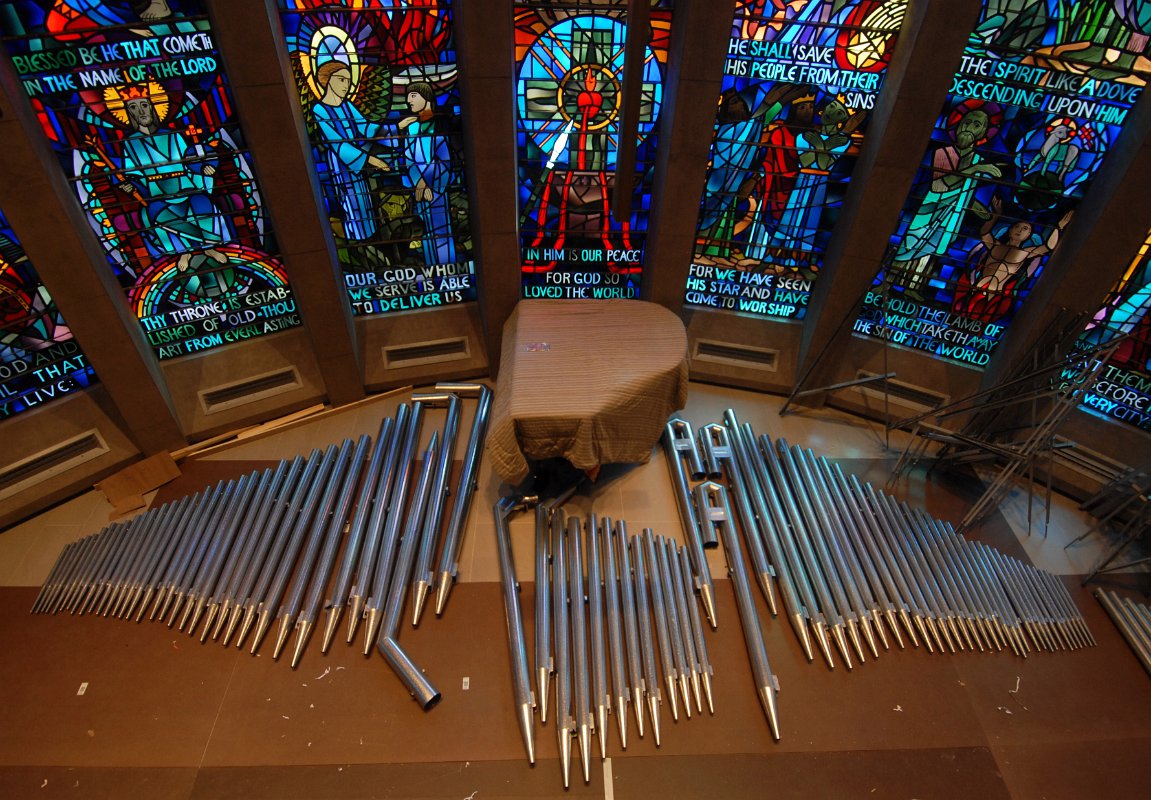 DSC_6072.JPG - Pipes staged in the Chancel for installation.