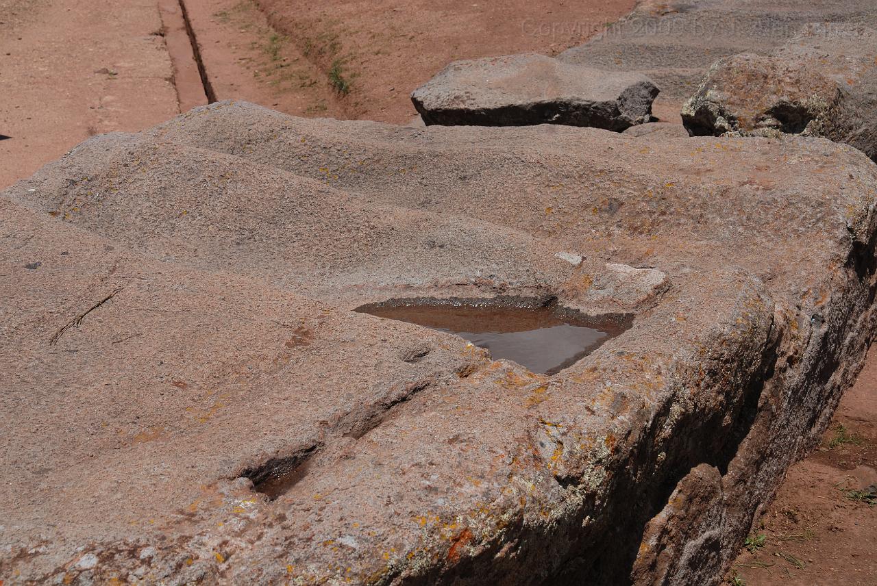 DSC_2906.JPG - Cavities where sacrificial victims were placed to be beheaded.