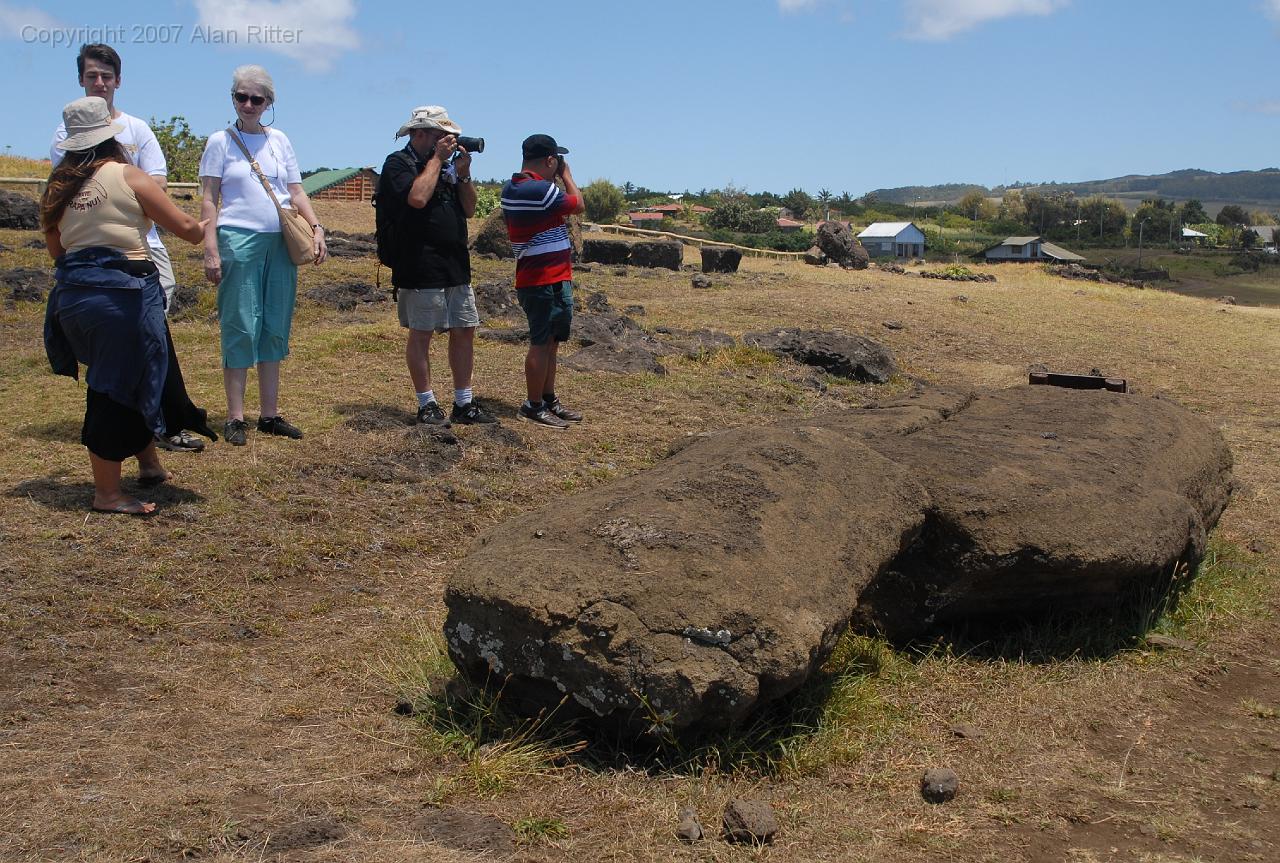 Slide_005.jpg - Moai Damaged in Transportation.
Note People for Scale