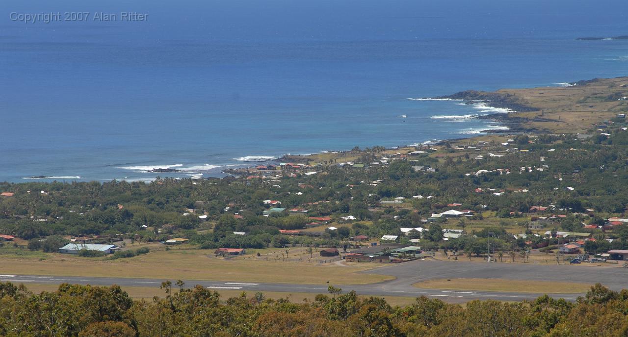 Slide_042.jpg - Main Town of Hanga Roa from the Road up to Rano Kau Crater.  The Runway was Lengthened and Paved by NASA as an Emergency Landing Site for the Space Shuttle.  (Now 3800 Meters or 12,500' Long)